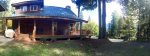 Front and side view of cabin, room to park 2 -3 cars, bbq grill by the front entrance